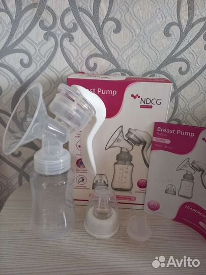 Молокоотсос ручной Breast Pump новый