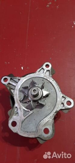 Насос водяной (помпа) Toyota Corolla E150 1zrfe