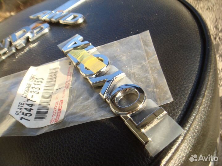 Тойота Камри Эмблема задняя Camry 50 2011-18