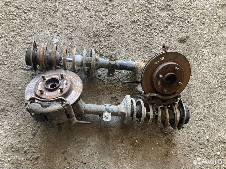 Передние стойки ford escort 92 год