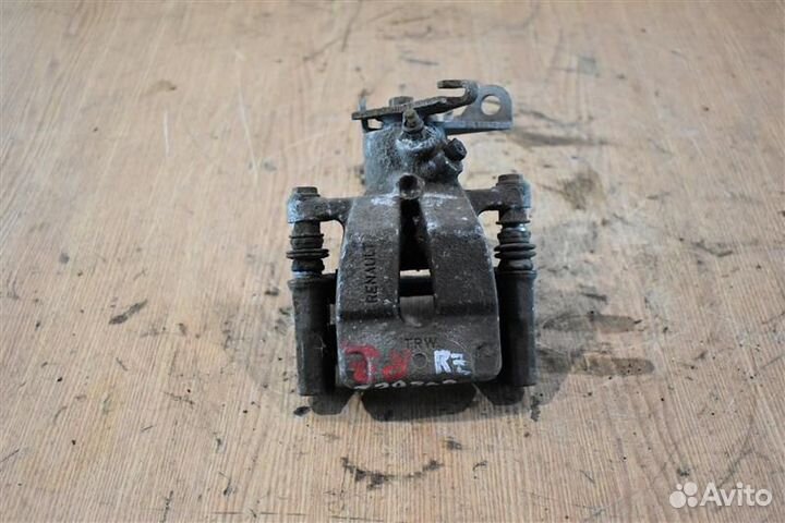 Суппорт тормозной задний правый Renault Megane