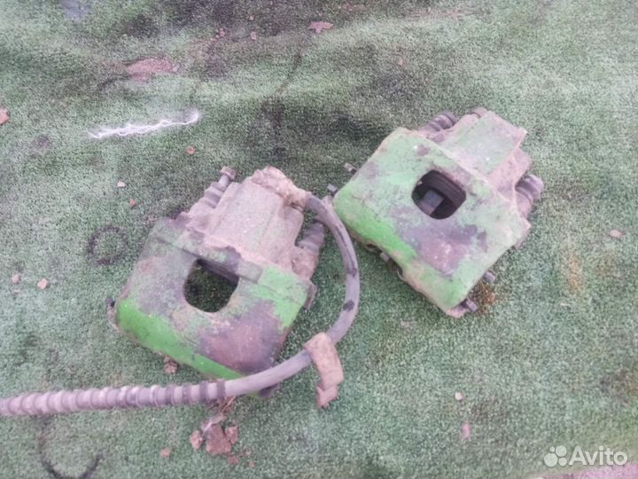 Суппорт тормозной передний Chrysler Voyager 3