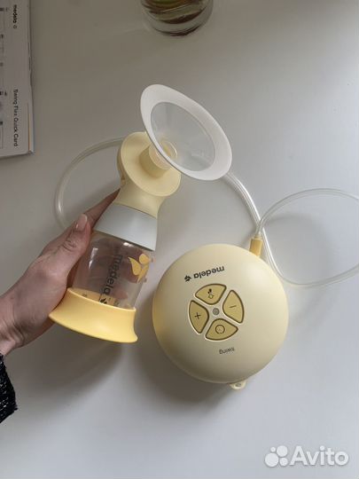 Молокоотсос medela электрический