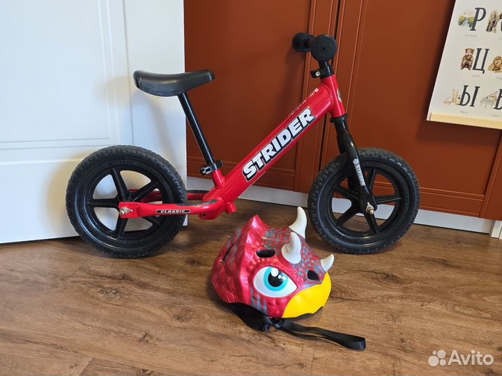 Беговел strider sport и шлем динозавр из Америки