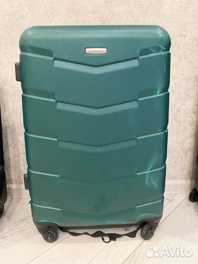 Чемодан дорожный на колесах