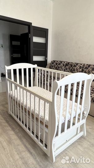 Детская кроватка Лель с ящиком и маятником