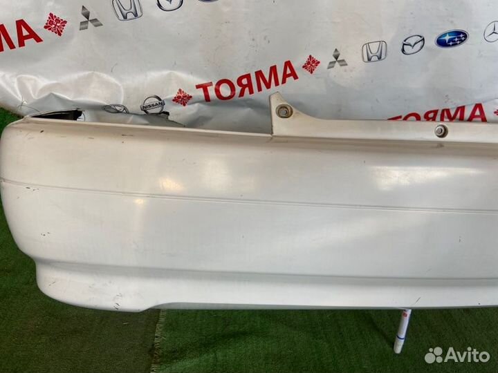 Бампер задний Toyota Carina AT210