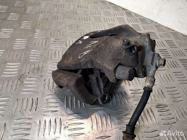 Суппорт передний левый Опель Зафира А