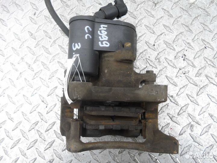 Суппорт задний левый Volkswagen Passat CC 357