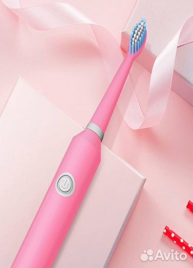 Электрическая зубная щетка новая