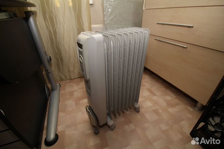 Масляный обогреватель DeLonghi 9 секций