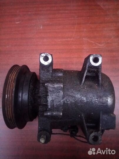 Компрессор кондиционера на Ниссан примера р 11