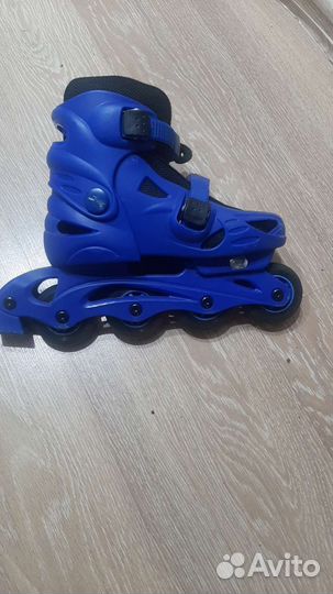 Роликовые коньки