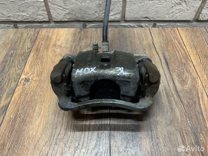 Kia Mohave Суппорт тормозной задний LH RH