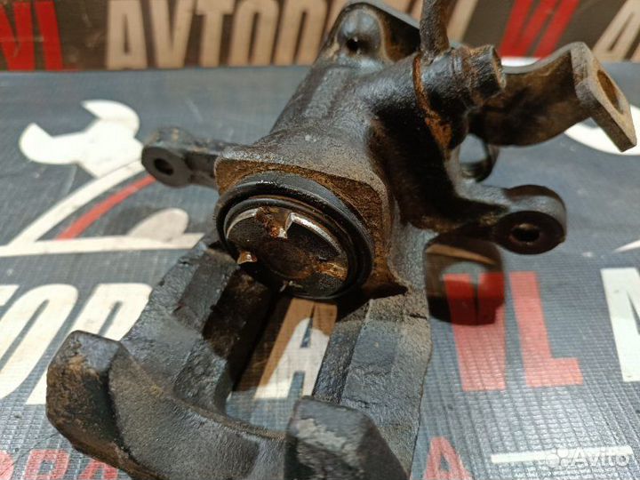 Суппорт тормозной задний левый Hyundai Solaris