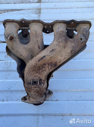 Выпускной коллектор Lancer X 2.0