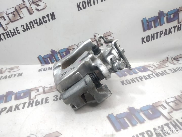 Суппорт задний правый Toyota Corolla 150