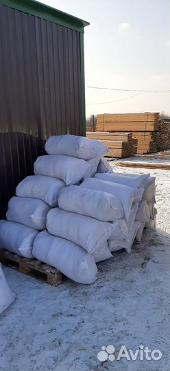 Опилки в мешках