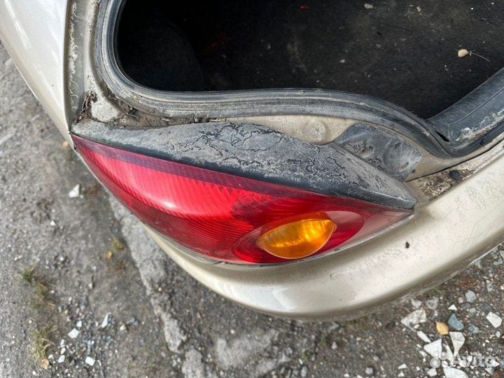 Фонарь задний левый Kia Rio седан 1.5 A5D 2001