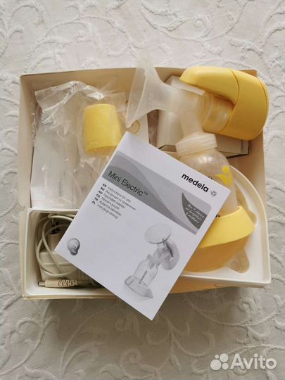 Молокоотсос medela электрический