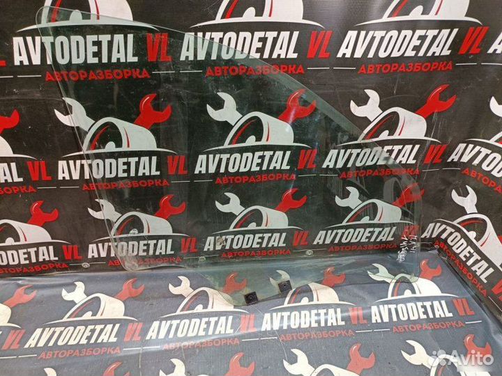 Стекло двери переднее левое Renault Logan седан