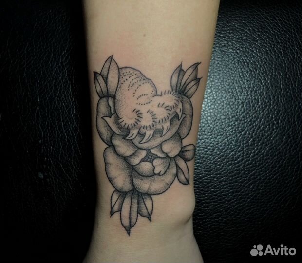 Мастер по татуировкам