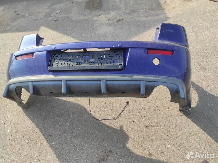 Бампер задний с диффузором mitsubishi lancer 10