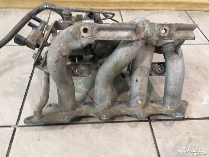 Впускной коллектор Mitsubishi Lancer 9