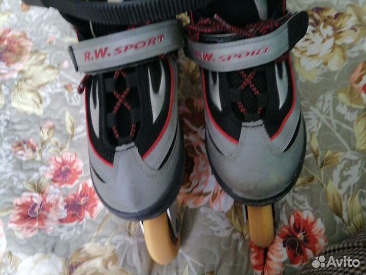 Роликовые коньки