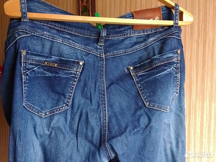 Джинсы женские /дырявые/новые,р-р52