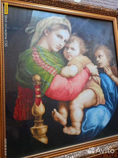 Мадонна с младенцем Рафаэля Санти