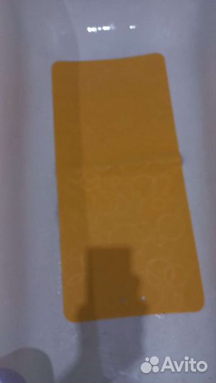 Противоскользящий коврик в ванну