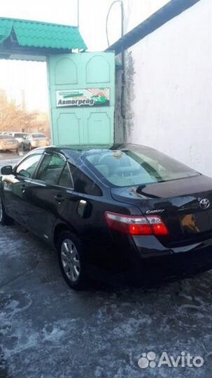 Суппорт тормозной задний левый Toyota Camry ACV40