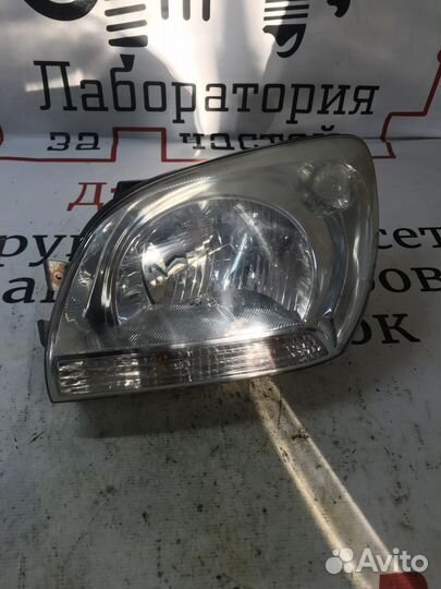 Фара левая Kia Sportage II (2004—2008)