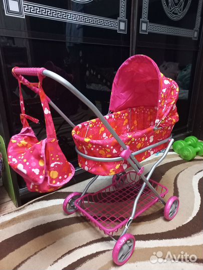 Игрушечная коляска для кукол