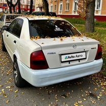 Mazda Familia 1.3 AT, 1998, 490 000 км, с пробегом, цена 300 000 руб.