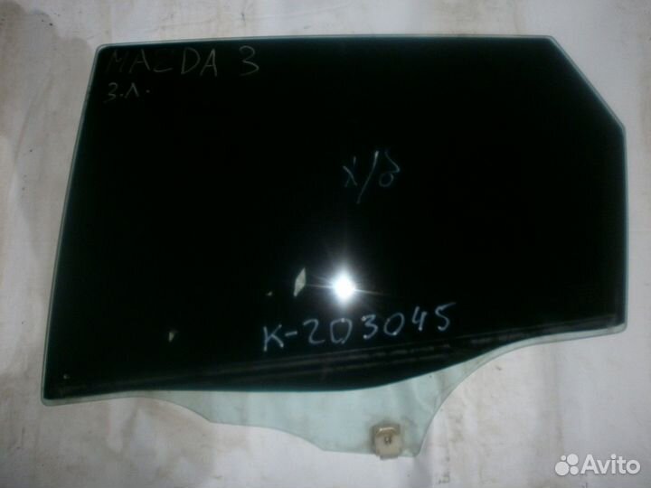 Стекло двери задней левой (Mazda 3)