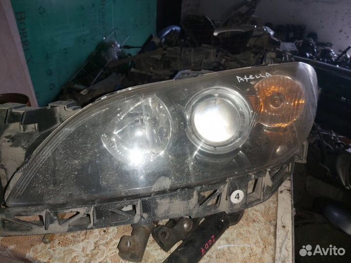 Фара галогеновая передняя левая Mazda Axela BK5P