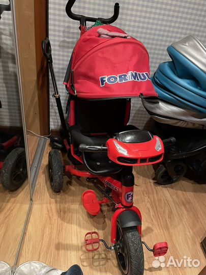 Прогулочная коляска велосипед