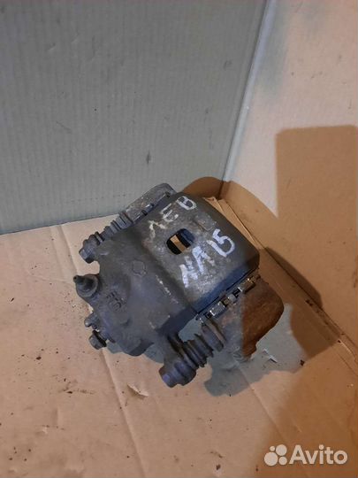 Суппорт передний левый nissan almera N15