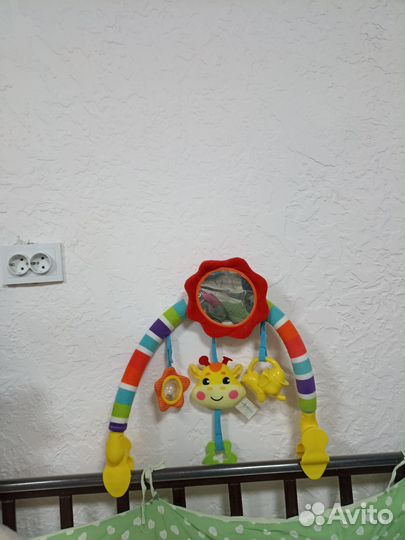 Дуга с игрушками для авто