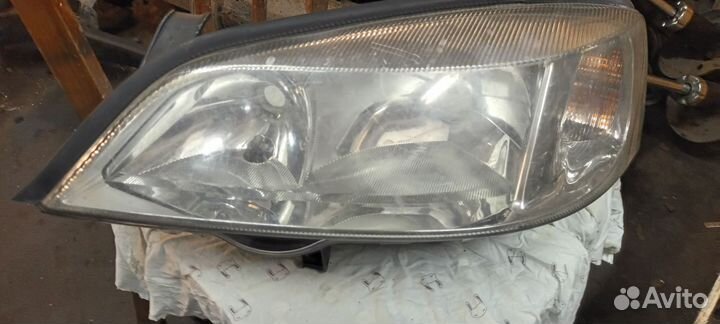 Фара левая Opel Astra G