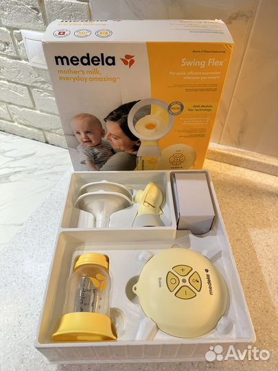 Молокоотсос medela swing flex электрический