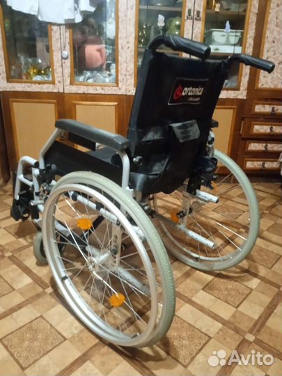 Инвалидная коляска