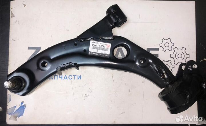 Рычаг передний нижний левый CX-7 (EH4434350C)