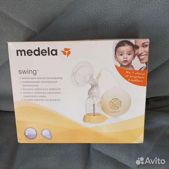 Молокоотсос medela электрический