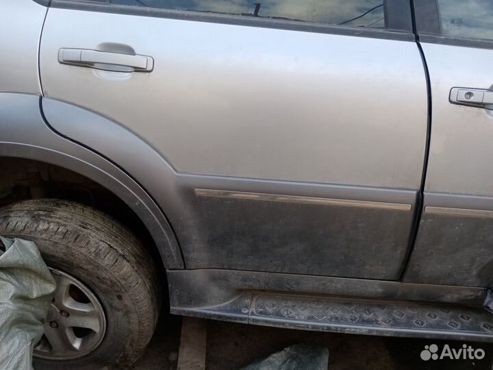 Накладка кузова на саненг Рекстон II 07г