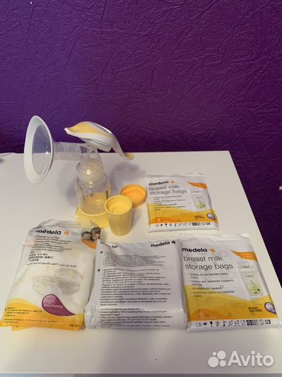 Молокоотсос ручной medela
