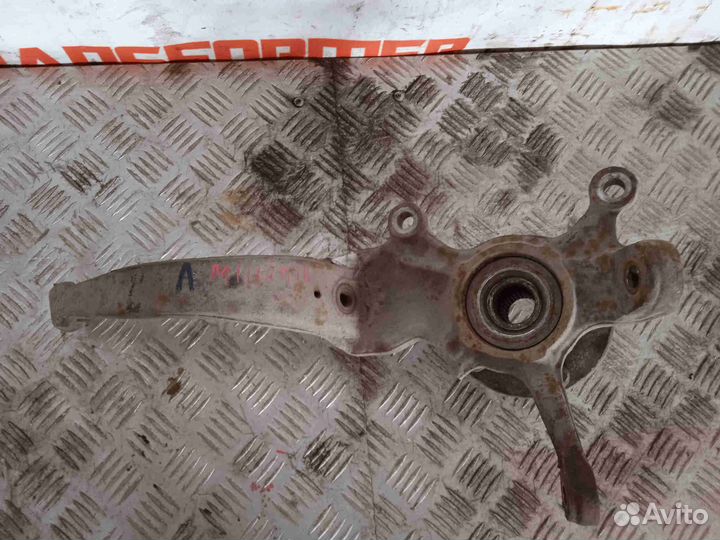 Кулак поворотный передний левый Мазда Милления TA