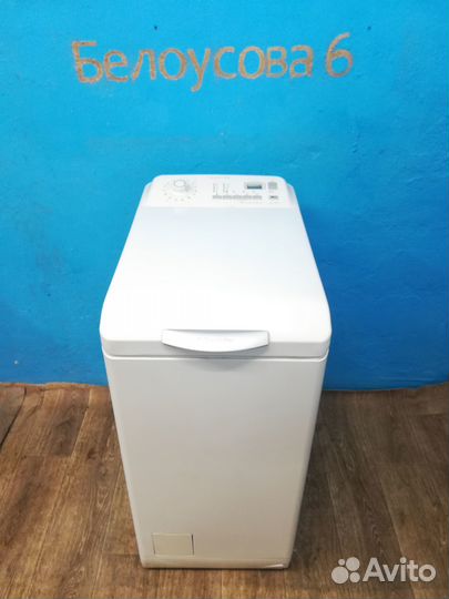 Electrolux с вертикальной загрузкой